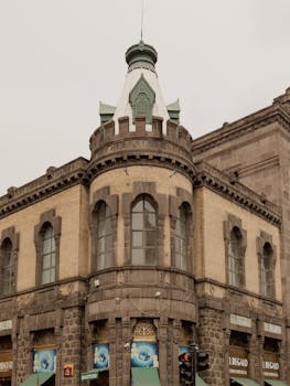 Stunning view of historic architecture at Mercado La Victoria in Puebla, Mexico, featuring unique stonework and design.